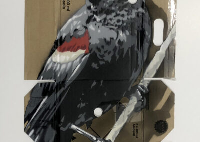 red winged black bird spray paint and stencil art on reclaimed Montana 94 box