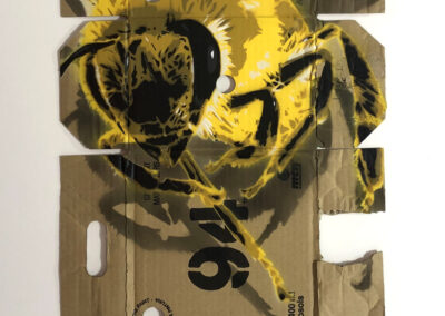 honey bee in flight spray paint and stencil art on reclaimed Montana 94 box