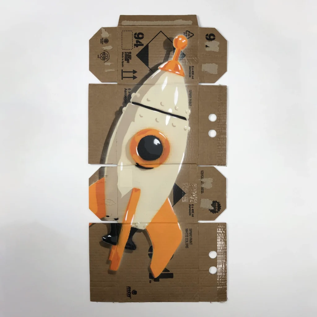 rocket orange spray paint stencil art on mtn 94 box